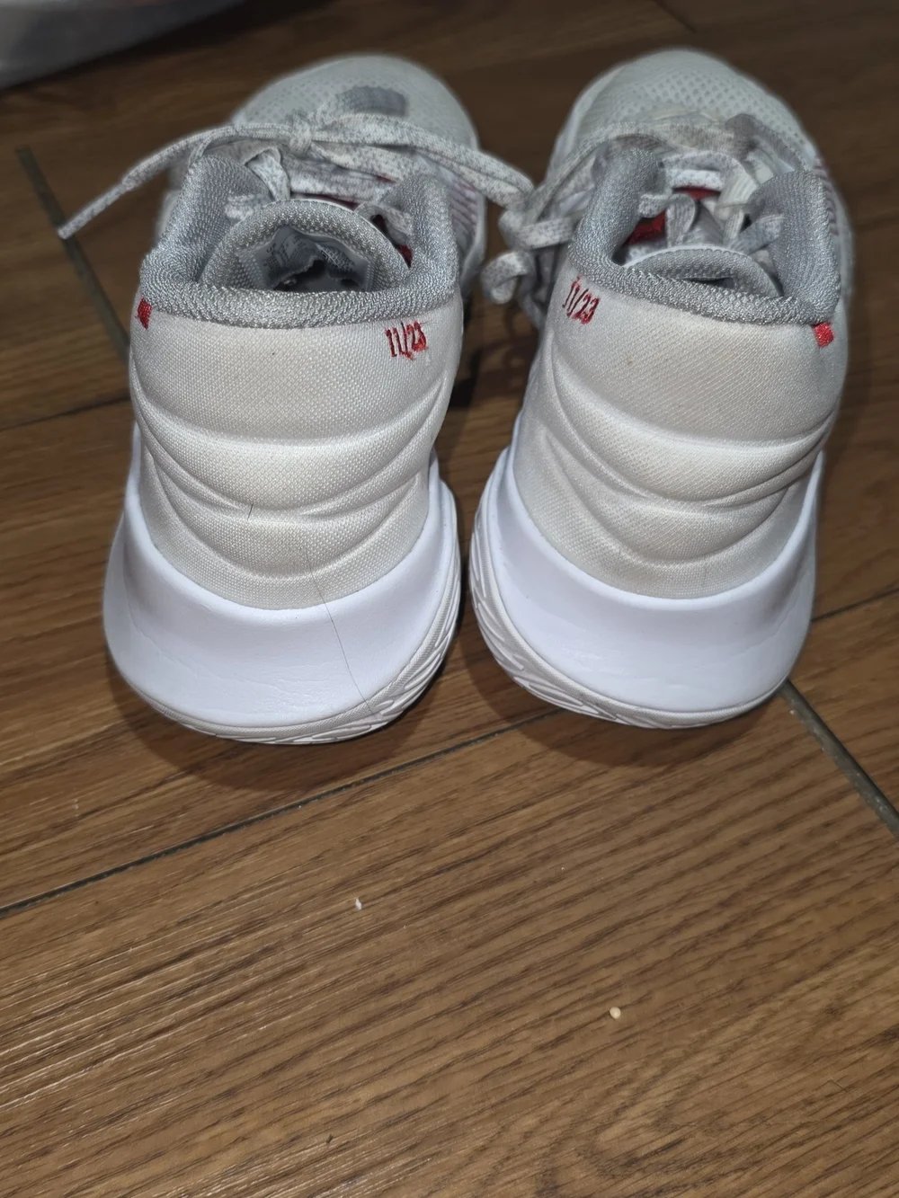 Nike White Sneakers with Red Accent